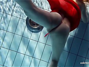 red-hot blonde Lucie French nubile in the pool