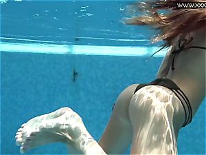 Tiffany Tatum takes off nude underwater